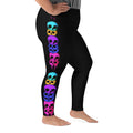 Rainbow skull pattern on black plus size leggings for Halloween.