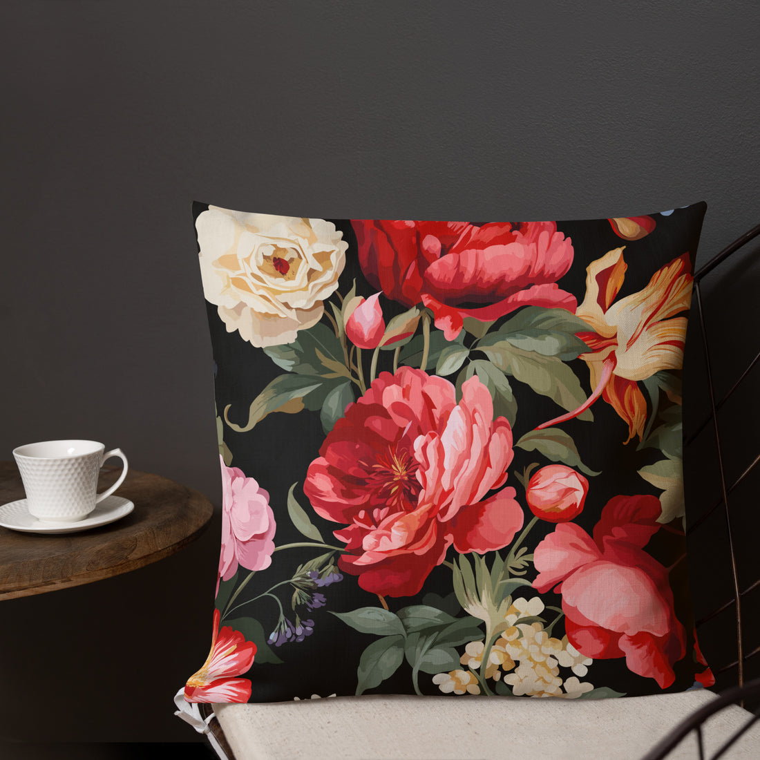 Vibrant floral premium pillow in a lush flower design with red, pink, and yellow blooms on a black background.