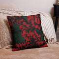 Luxurious floral premium throw pillow with rich red and green design on a soft background.