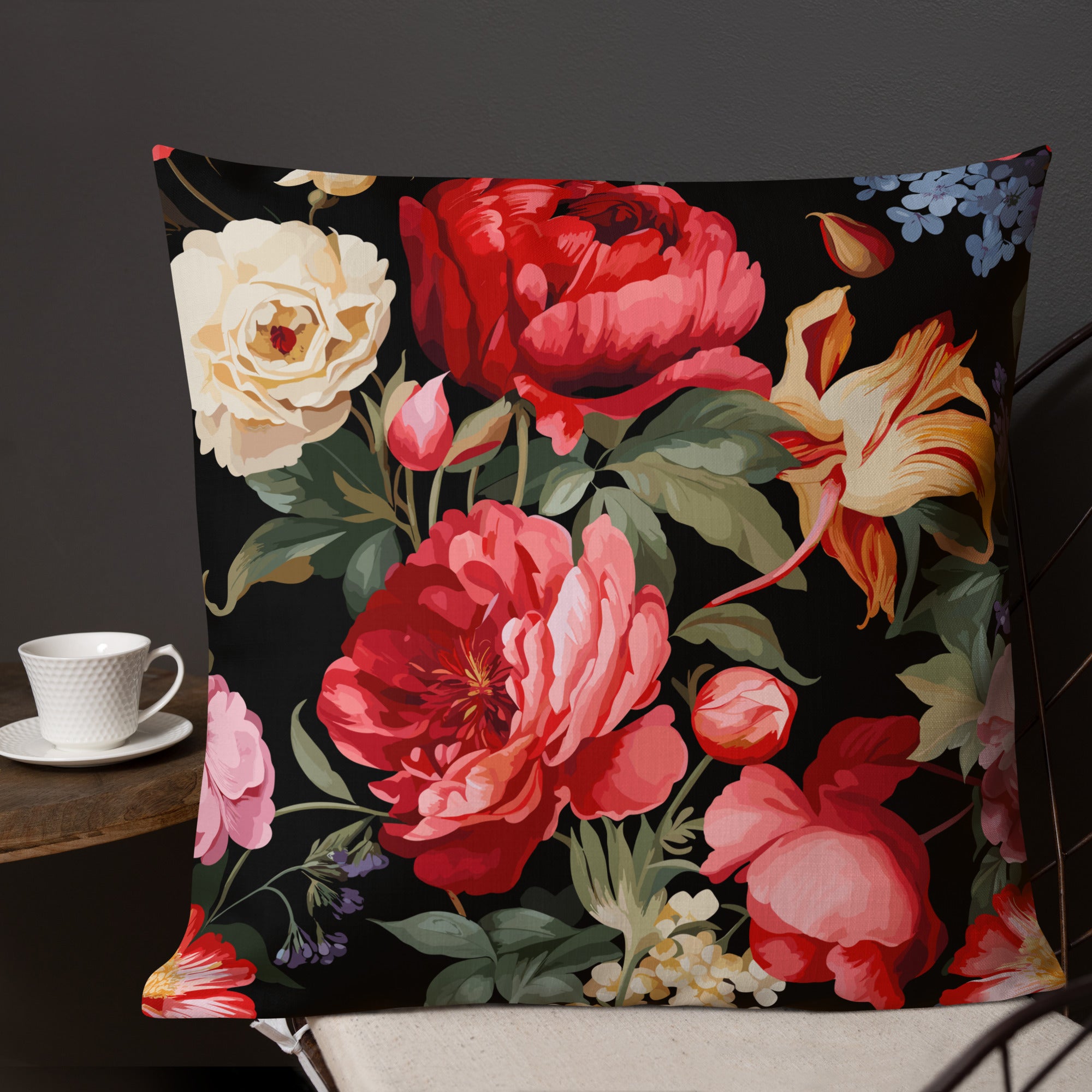 Vibrant floral premium pillow in a lush flower design with red, pink, and yellow blooms on a black background.