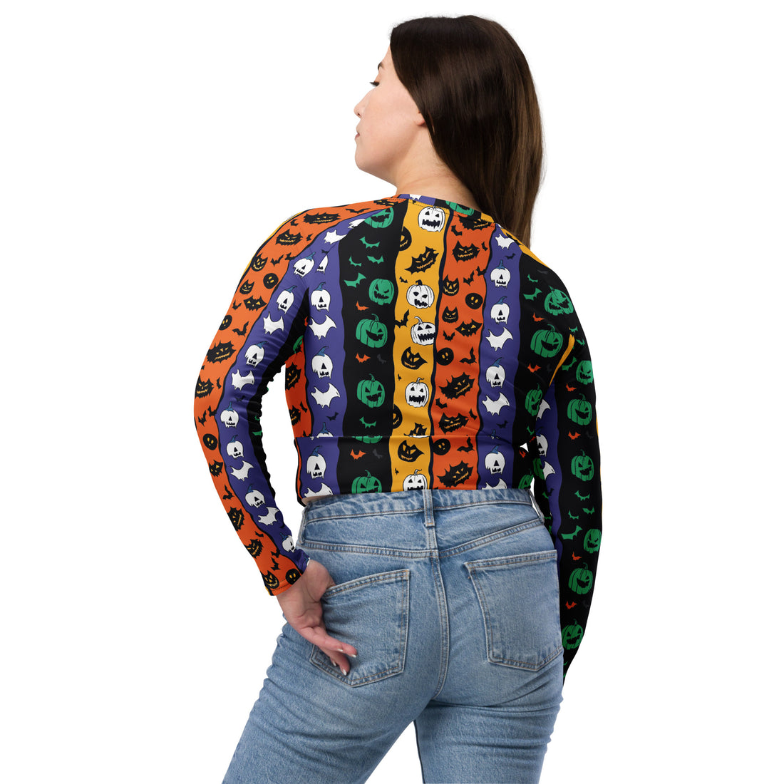 Halloween themed long sleeve crop top featuring colorful pumpkin and ghost designs on a vibrant background.