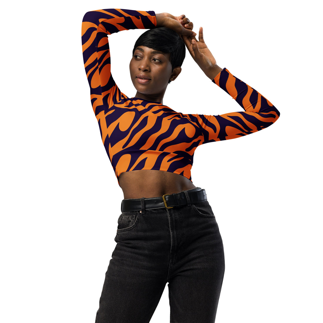 Model wearing an eco-friendly long-sleeve crop top with a tiger stripe design, showcasing a stylish and trendy look.