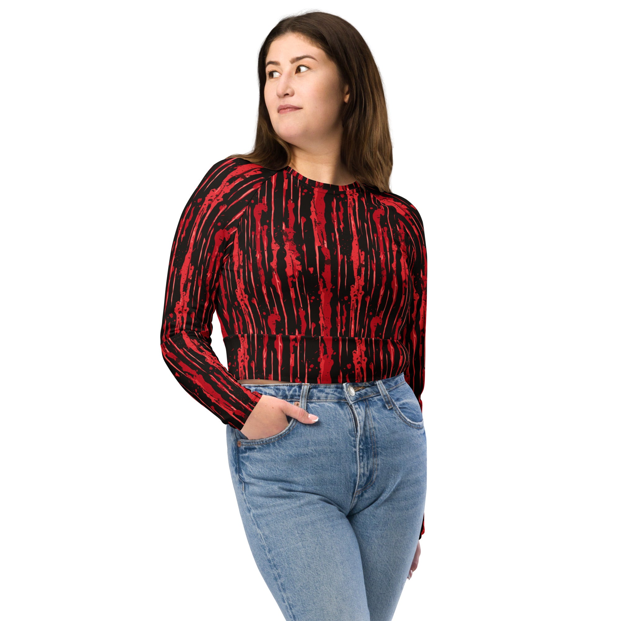 Women's recycled long-sleeve crop top in red and black blood-splatter design.