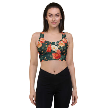 Eco-friendly floral longline sports bra featuring vibrant coral and cream flowers on a deep green background, perfect for activewear and winter fashion.