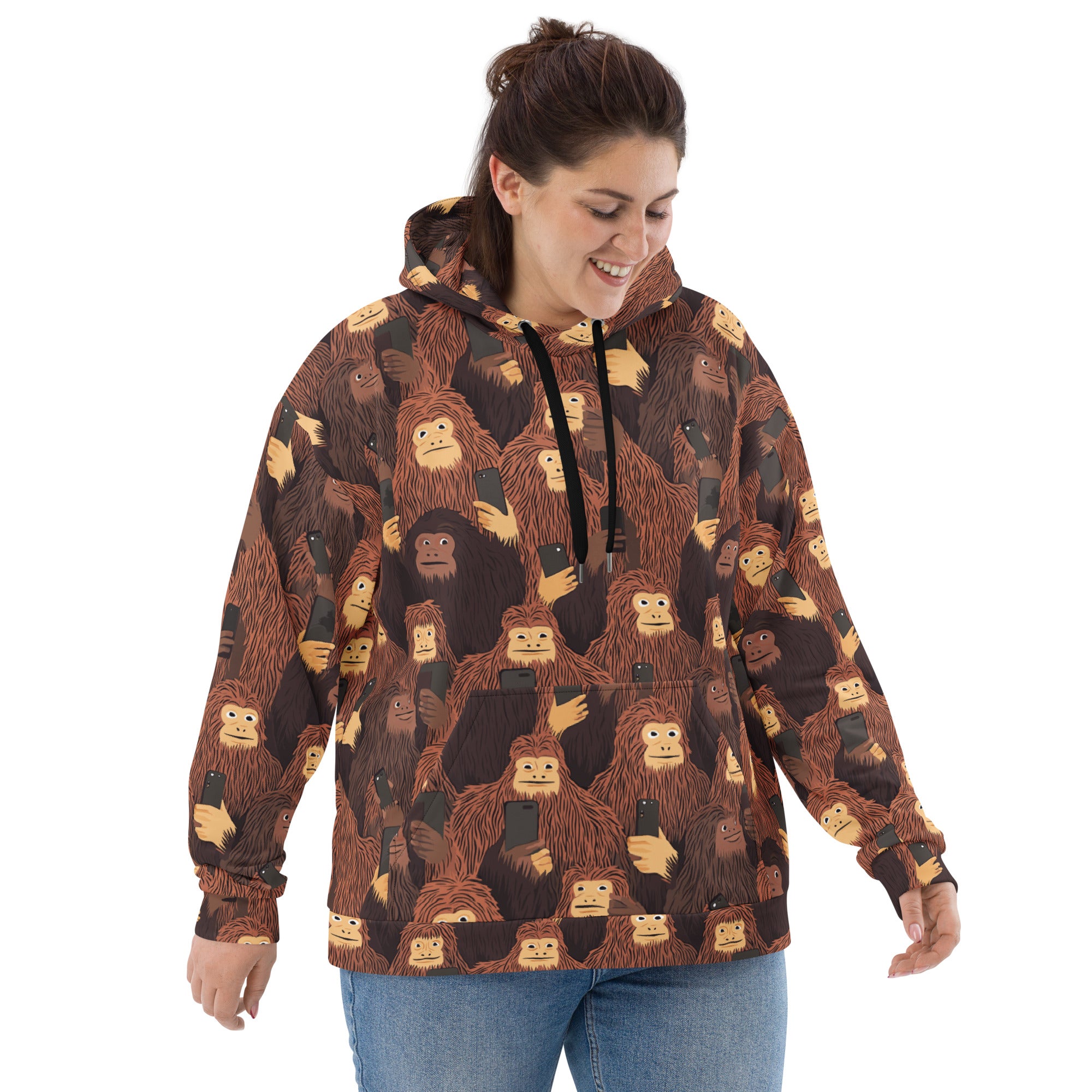 Halloween-inspired unisex hoodie featuring playful Bigfoot characters on a warm background.