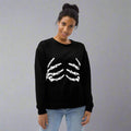 Spooky Skeleton Graphic Sweatshirt for Women in black with white skeleton design.