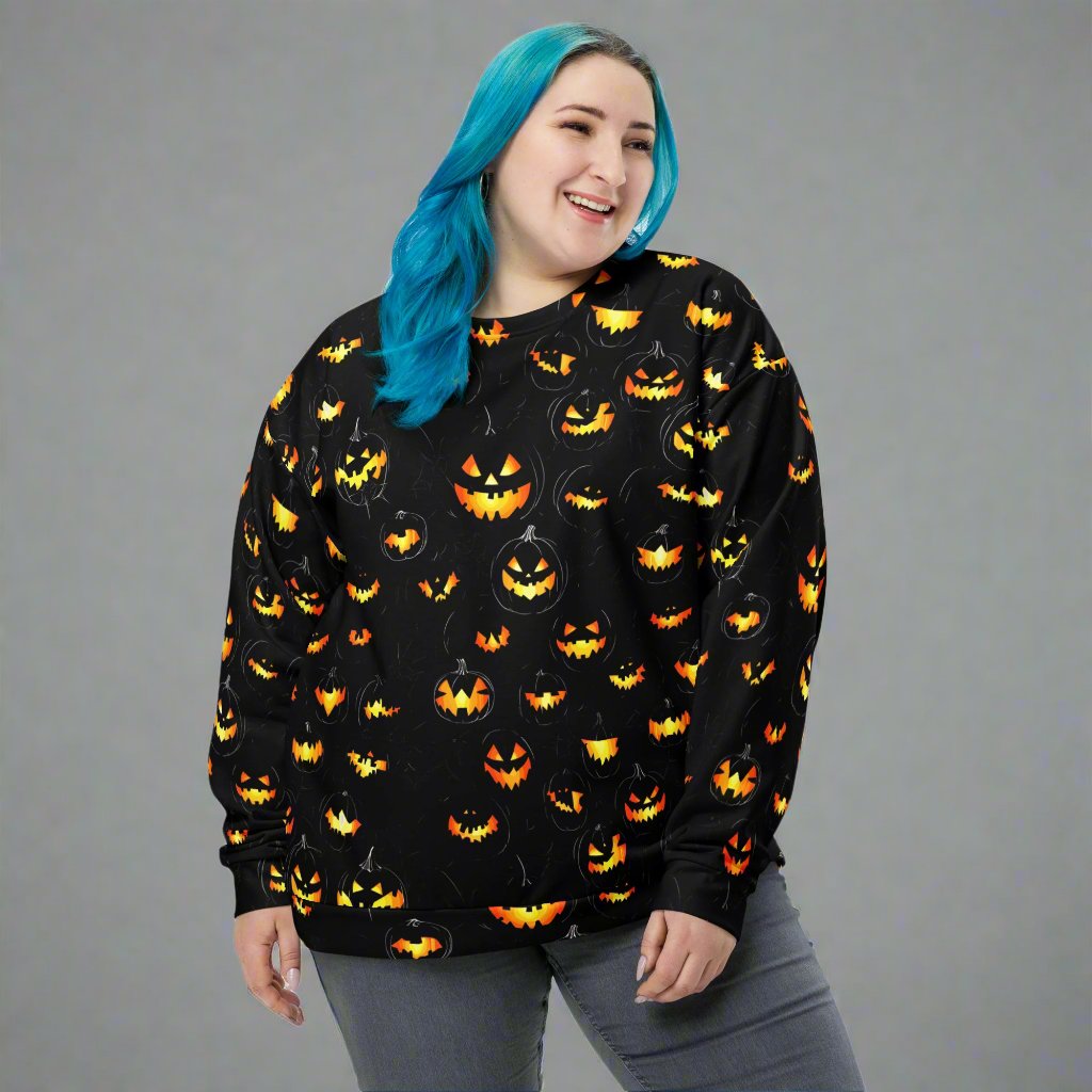 Playful pumpkin print sweatshirt featuring vibrant pumpkin designs on a black background.