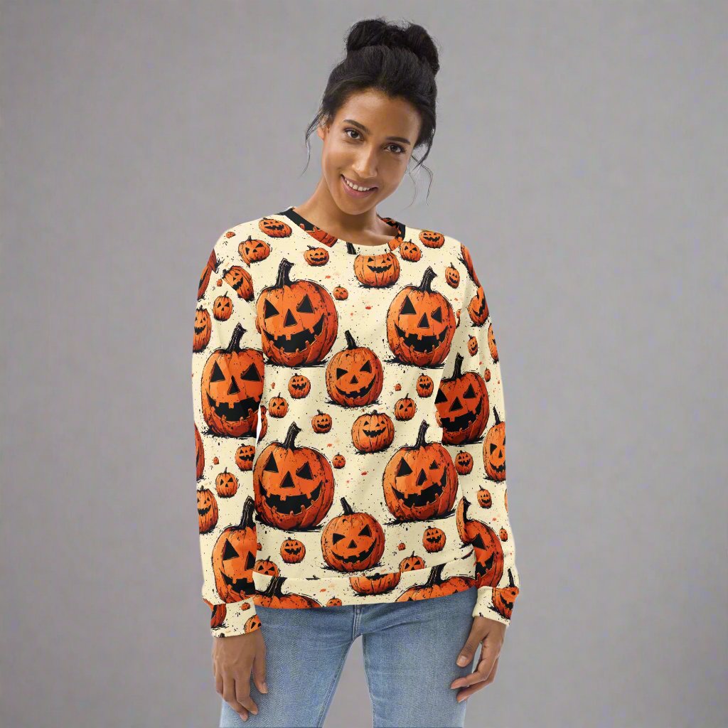 Halloween-themed sweatshirt with a vibrant pumpkin print in orange and yellow tones, perfect for autumn festivities.