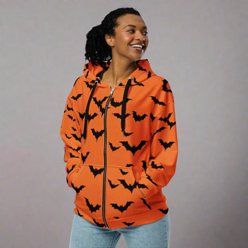 Halloween Bat Zip Hoodie for Women in vibrant orange with bat print.