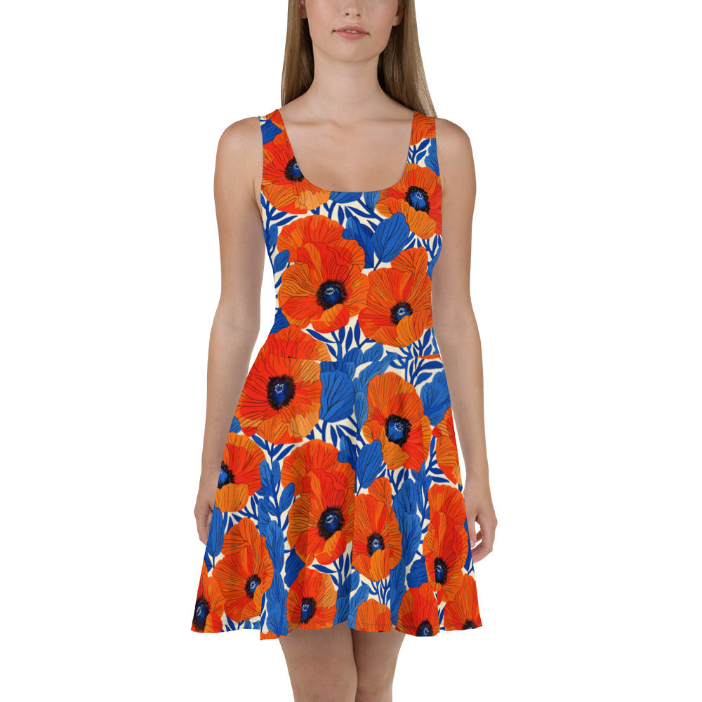 Vibrant floral skater dress featuring orange and blue flowers on a white background, perfect for summer occasions.