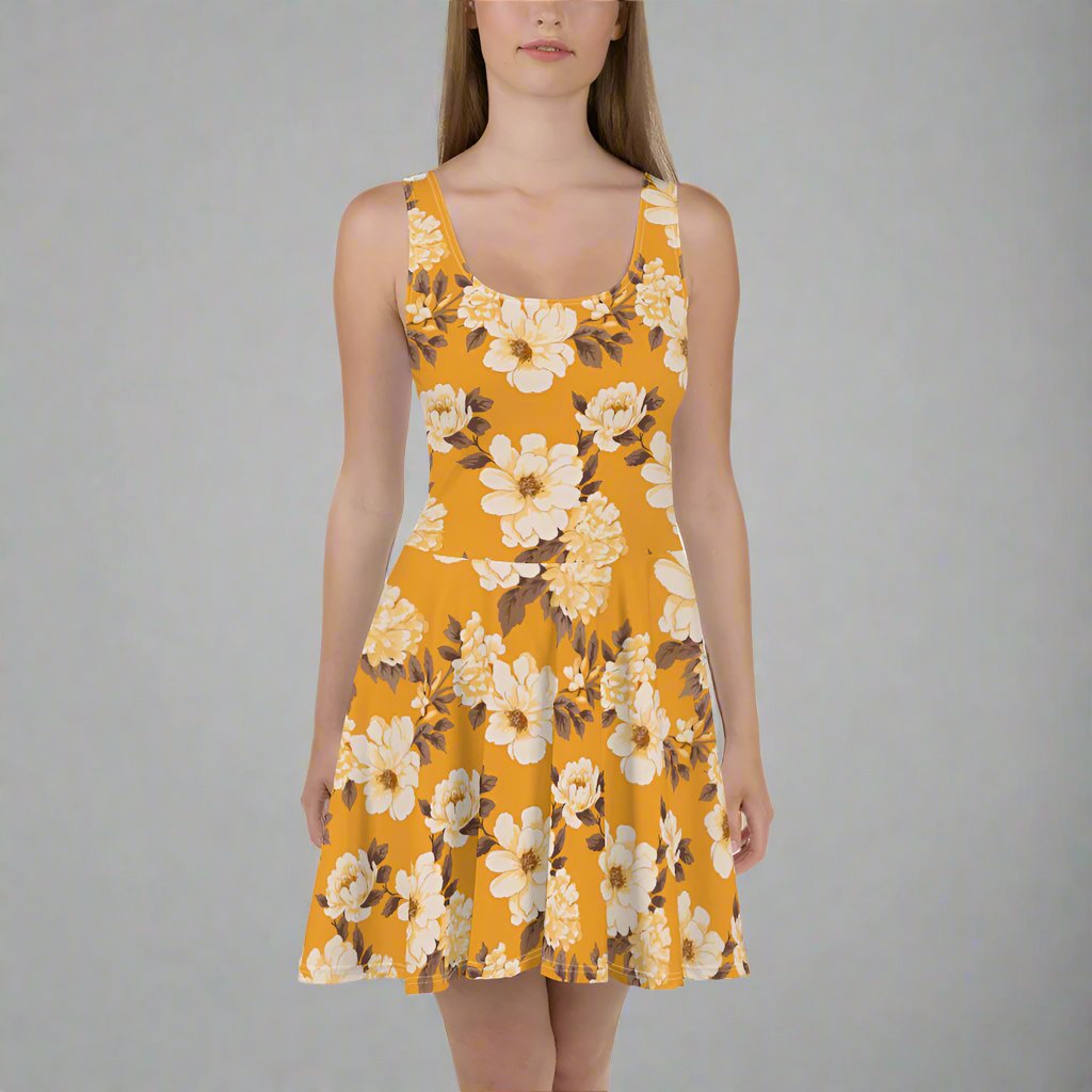 A model wearing a vibrant floral skater dress with a yellow background featuring large white and brown flowers.