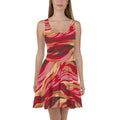 A vibrant abstract pattern skater dress in shades of red, beige, and brown.