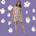 Halloween-themed skater dress featuring cute bat and ghost prints in vibrant colors.