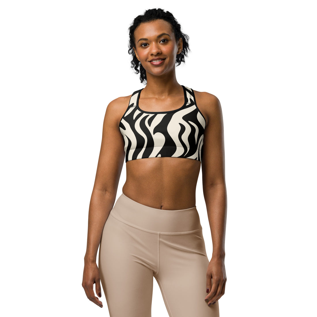 Zebra print sports bra with moisture-wicking fabric, designed for women's active wear.