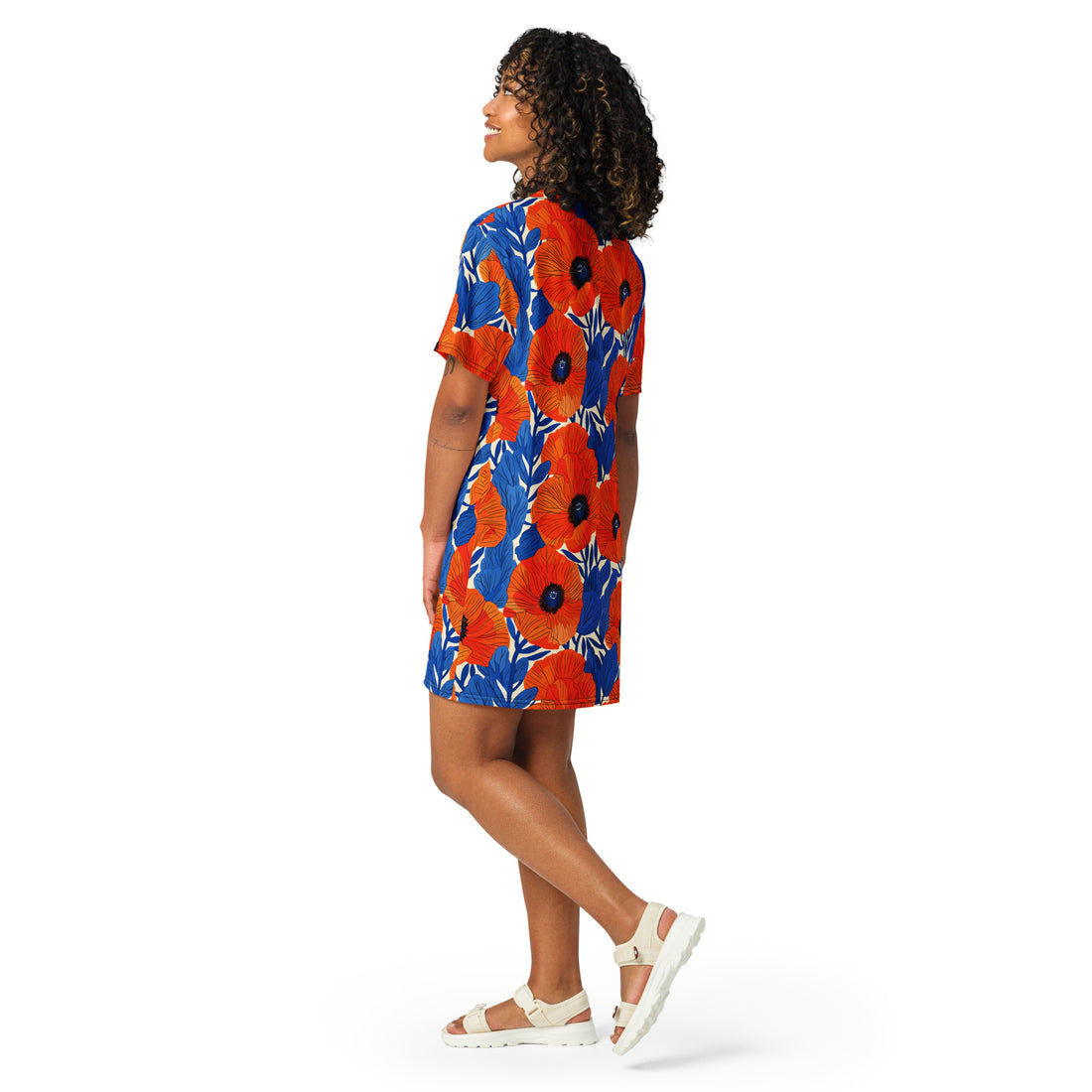 Vibrant floral oversized t-shirt dress featuring orange and blue poppy flowers on a model.