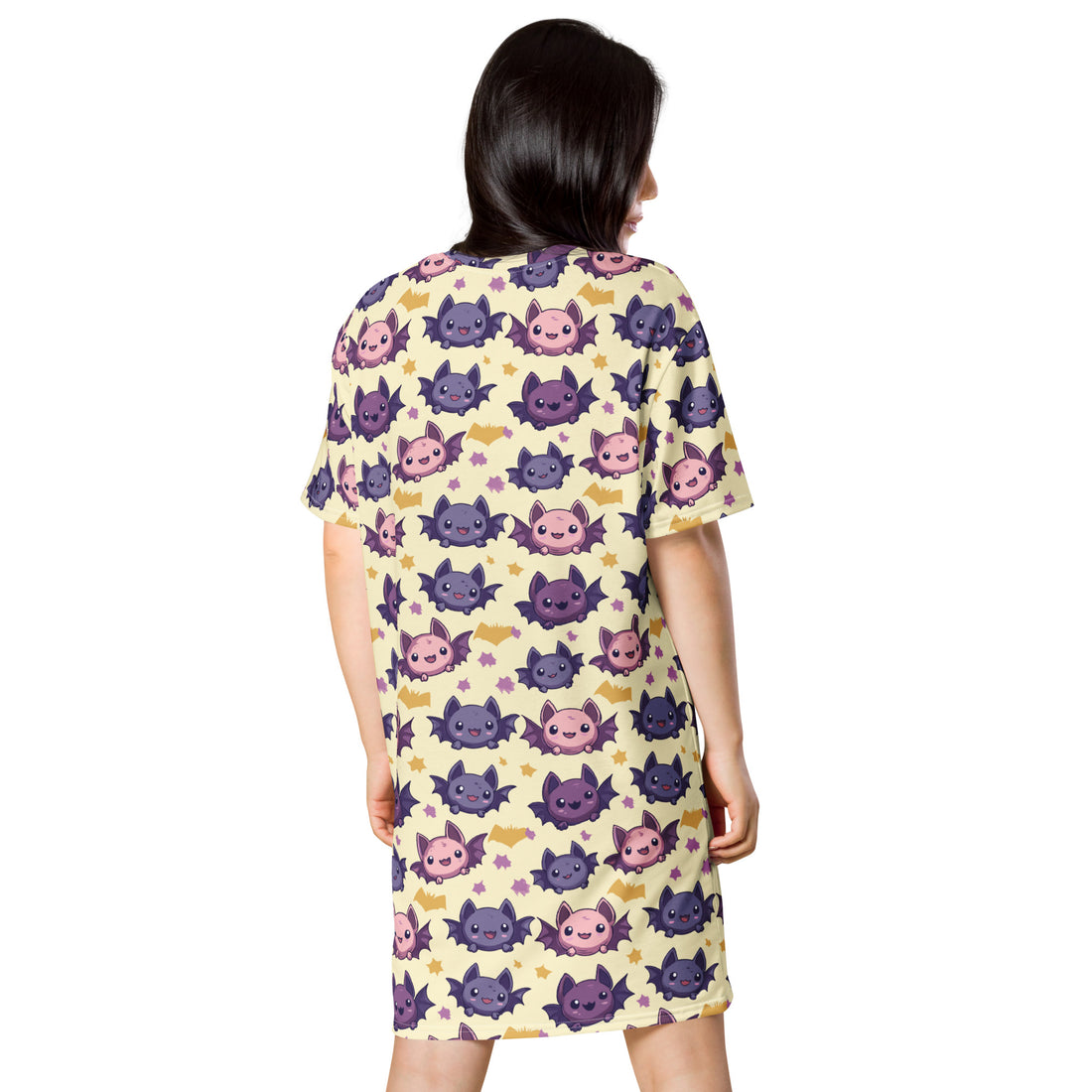 Women's T-shirt dress featuring a colorful bat and candy print, perfect for Halloween.