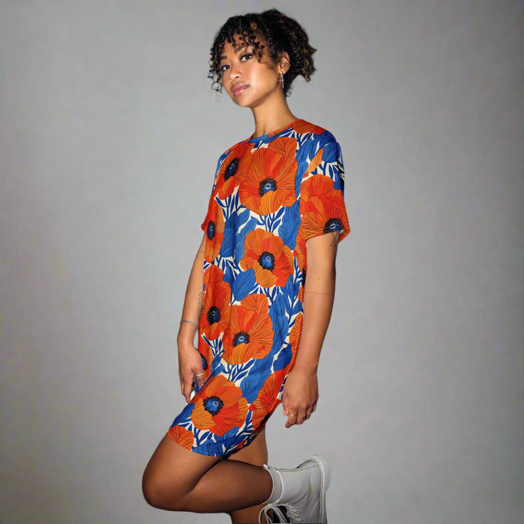 Vibrant floral oversized t-shirt dress featuring orange and blue poppy flowers on a model.