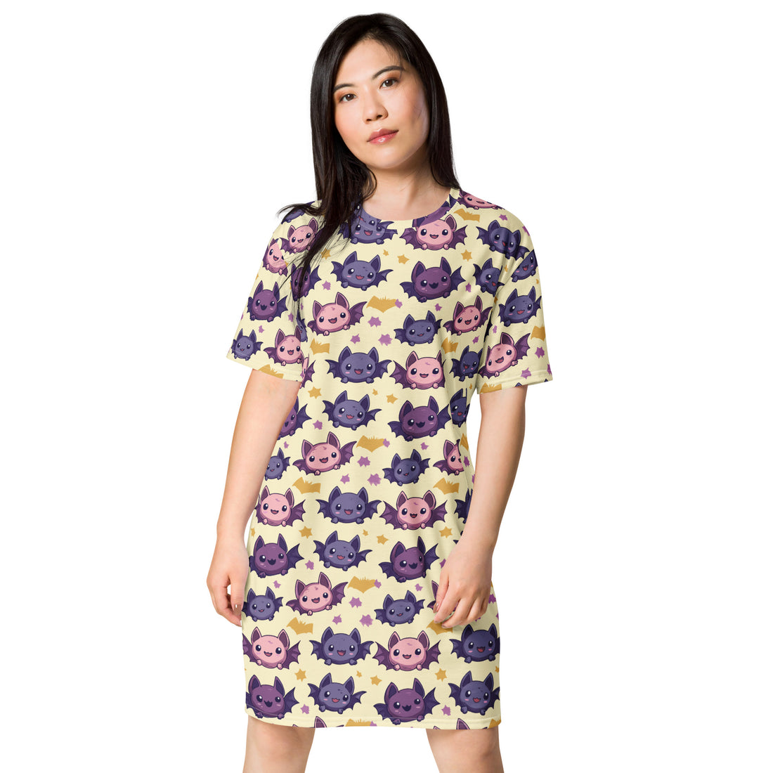 Women's T-shirt dress featuring a colorful bat and candy print, perfect for Halloween.