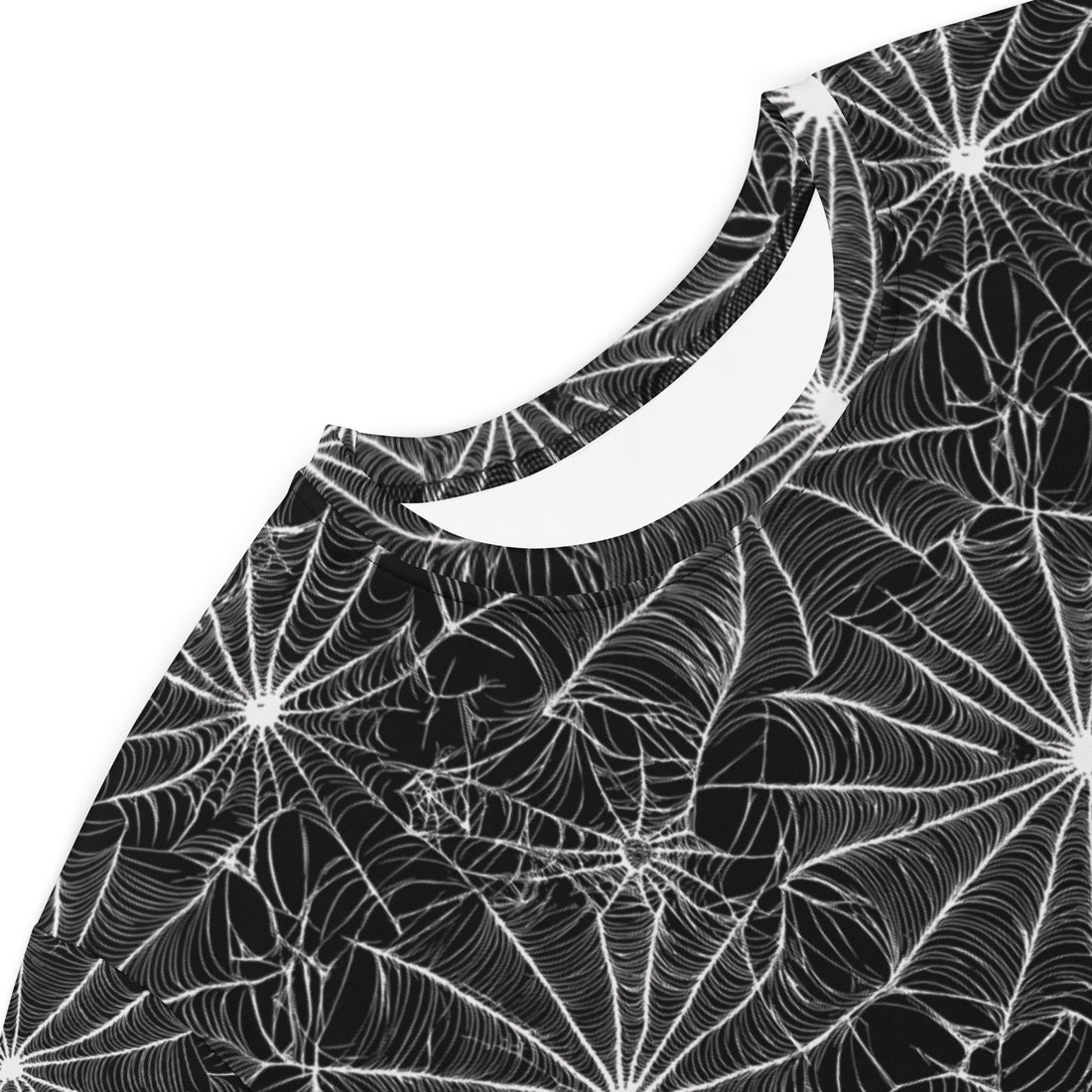 Spooky web print T-shirt dress; black with intricate white web design, comfortable oversized fit, styled casually with black sneakers.