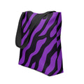 Purple zebra print tote bag with black handles, stylish and spacious.