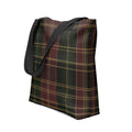 Plaid tartan tote bag in dark green, red, and yellow with durable black handles, perfect for fall and winter fashion.