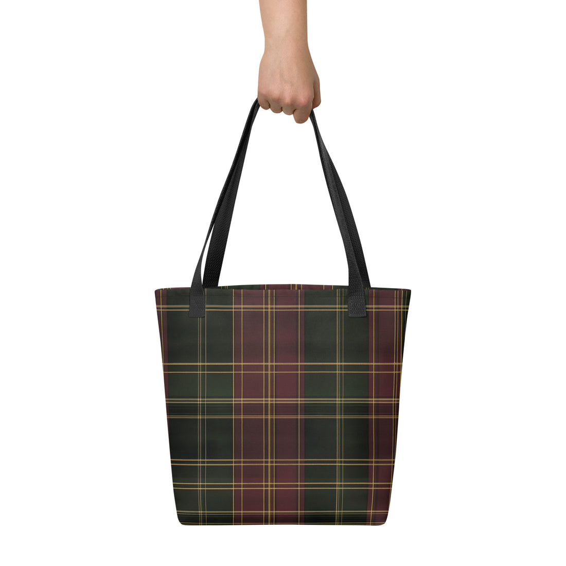 Plaid tartan tote bag in dark green, red, and yellow with durable black handles, perfect for fall and winter fashion.