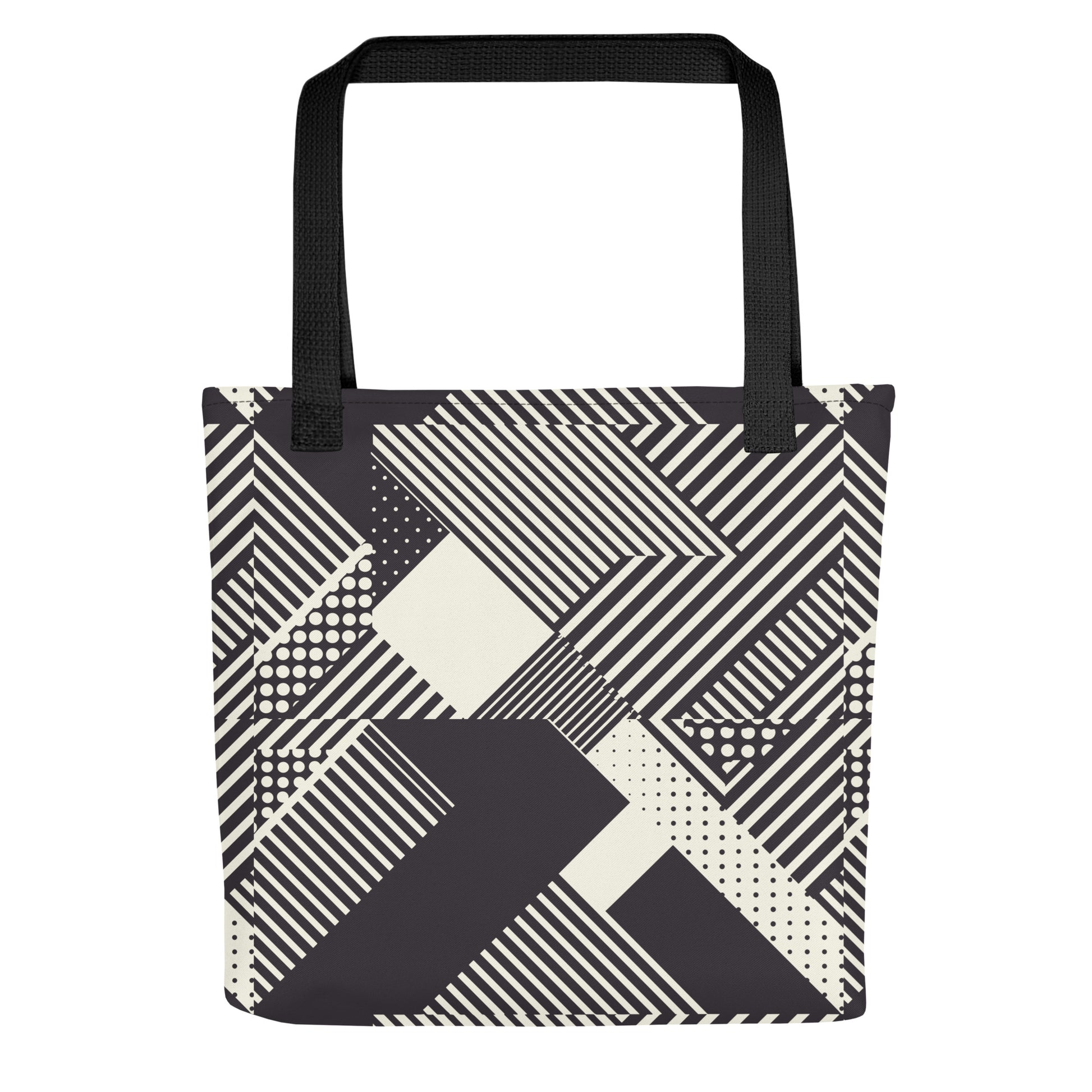 Chic monochrome tote bag with bold black and cream geometric patterns on a spacious design.