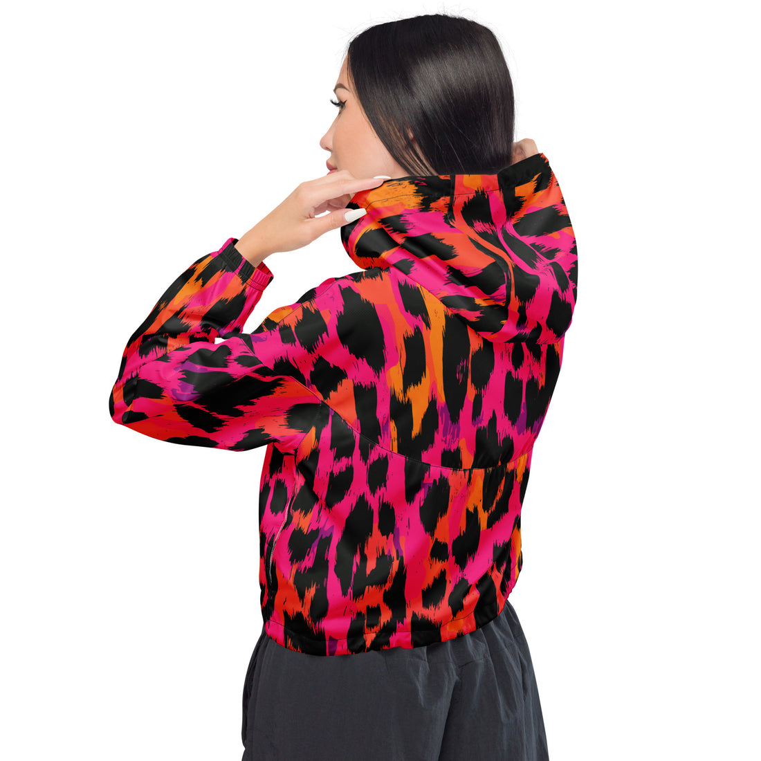 Women’s cropped windbreaker in bold leopard print with pink, orange, and black colors.