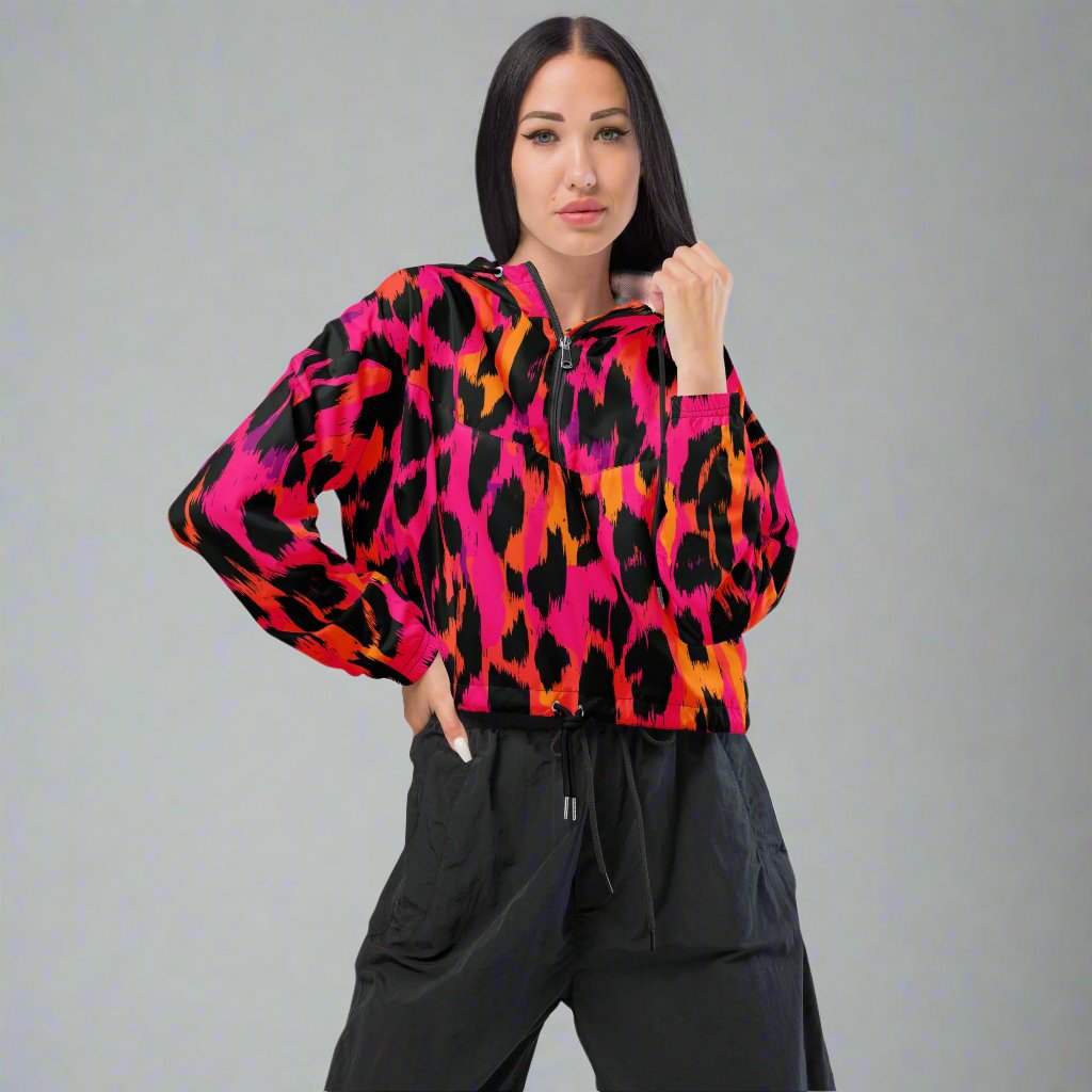 Women’s cropped windbreaker in bold leopard print with pink, orange, and black colors.