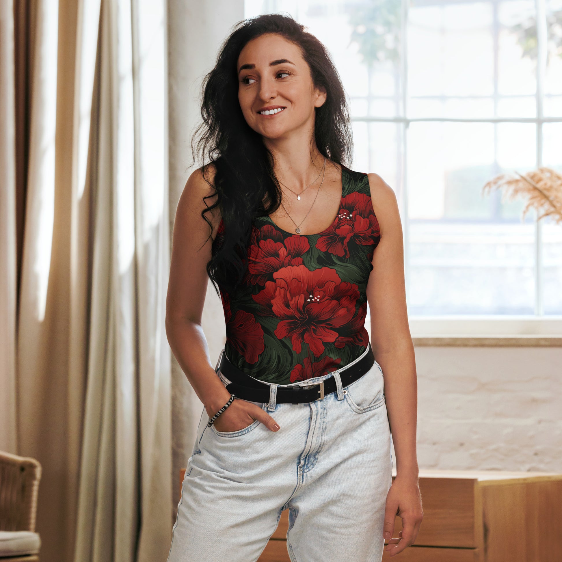 Women's floral cut and sew tank top with a vibrant floral pattern in red and green.