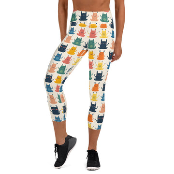 Halloween Monster Yoga Capri Leggings featuring colorful monster print on a soft fabric.