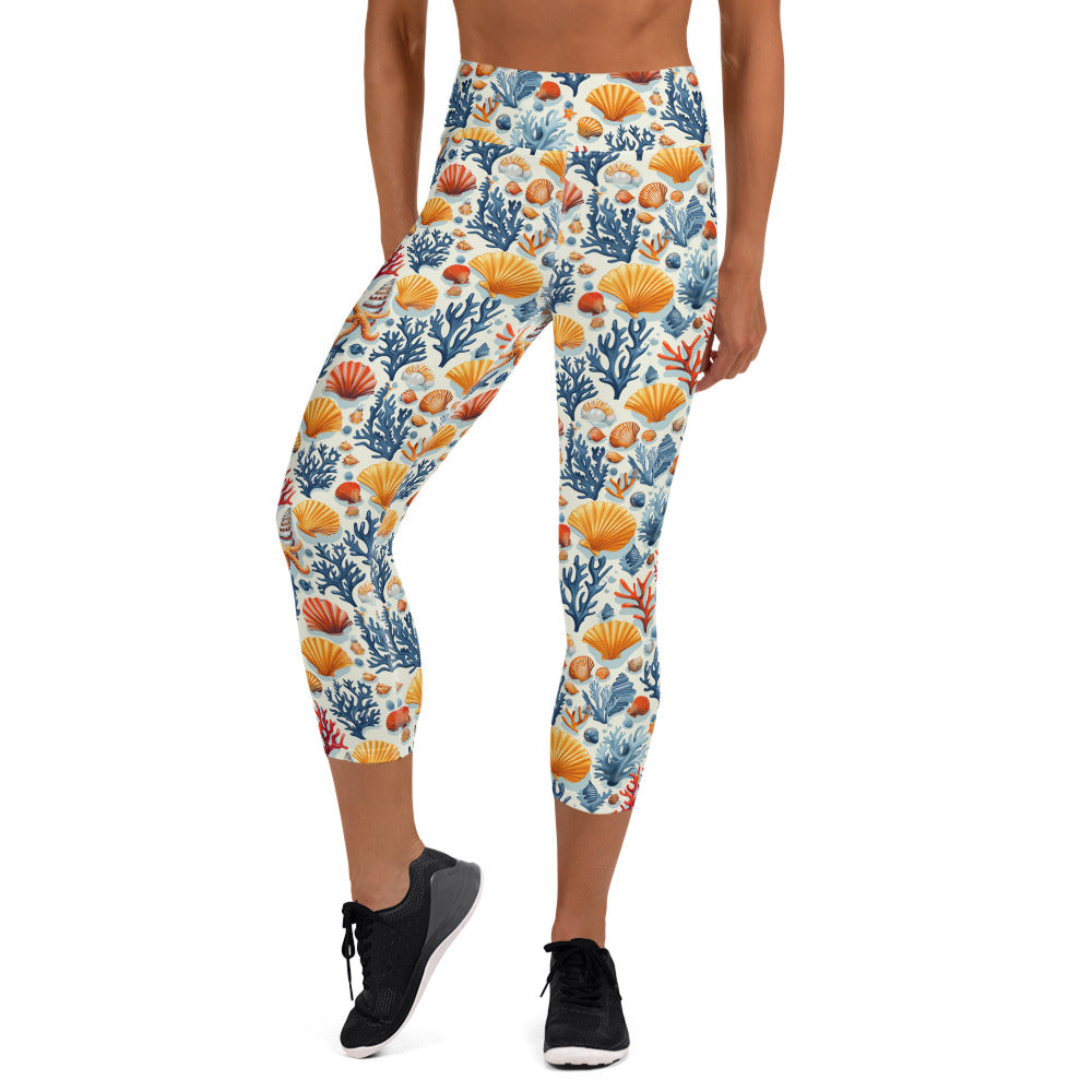 Capri leggings with vibrant oceanic coral and seashell pattern, high waistband, mid-calf length, activewear style