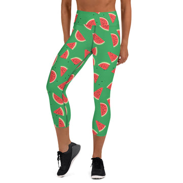 Green yoga capri leggings with playful watermelon print design highlighting the mid-calf length and comfortable high waistband.