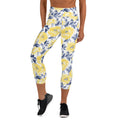 Yoga Capri Leggings with vibrant yellow peony floral design, high waistband, and mid-calf length, perfect for yoga and lounging.