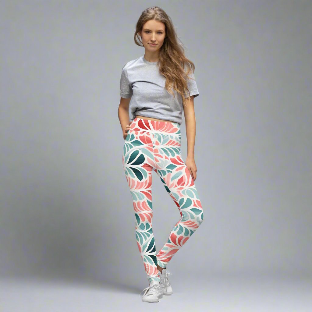 Floral Pattern Yoga Leggings in vibrant colors on a model standing outdoors.