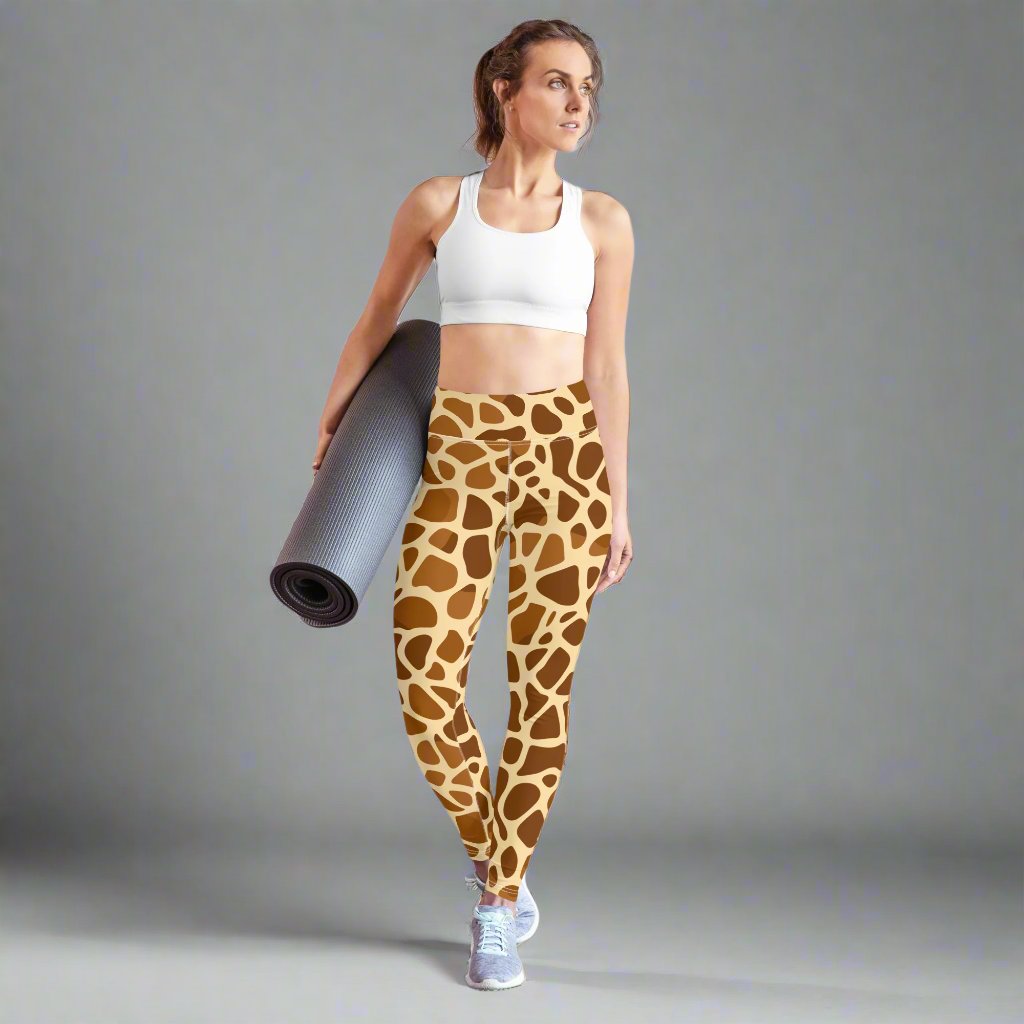 Giraffe print yoga leggings with raised waistband, perfect for workouts.