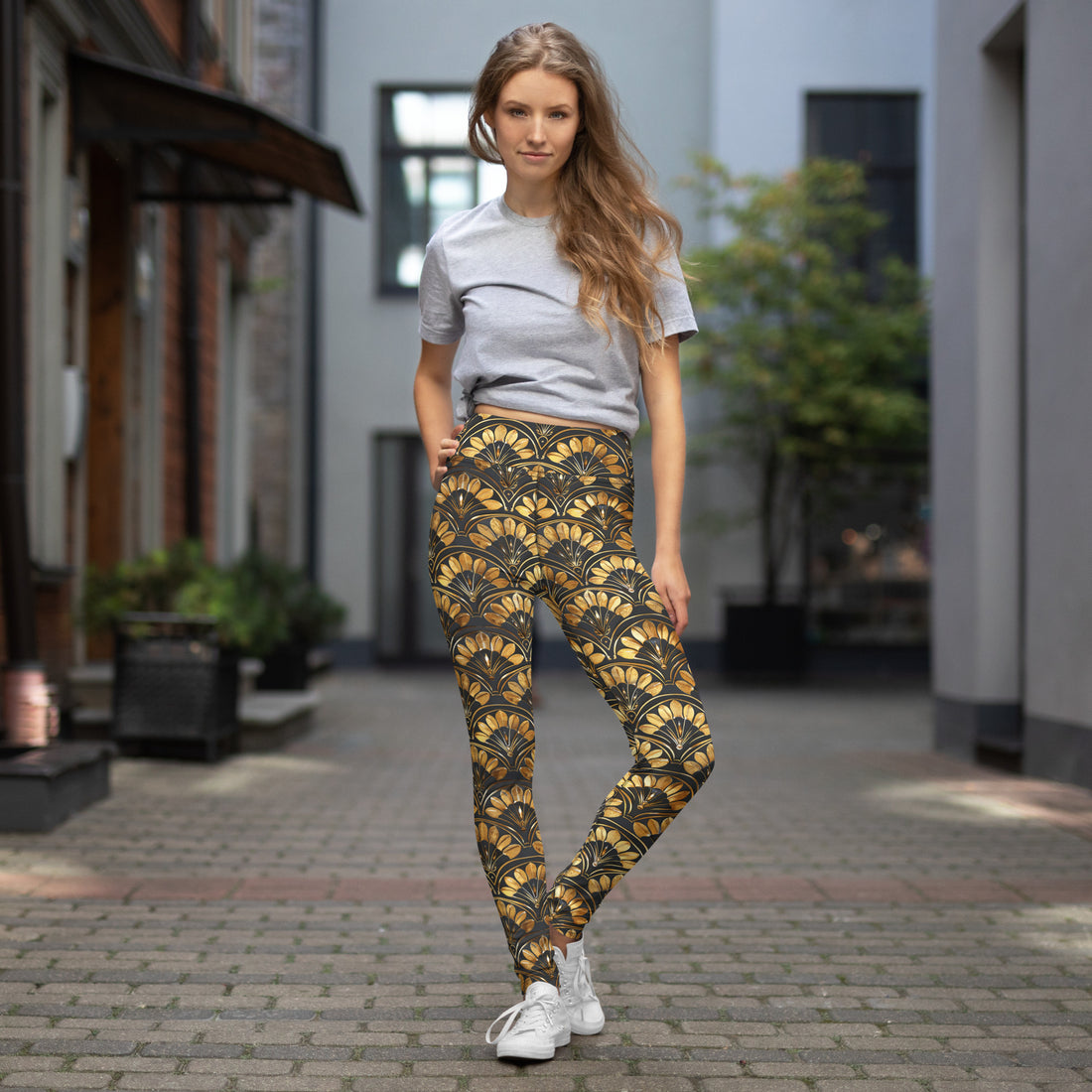 Halloween-inspired yoga leggings with a golden fan pattern, soft and stretchy, perfect for yoga sessions and casual wear.