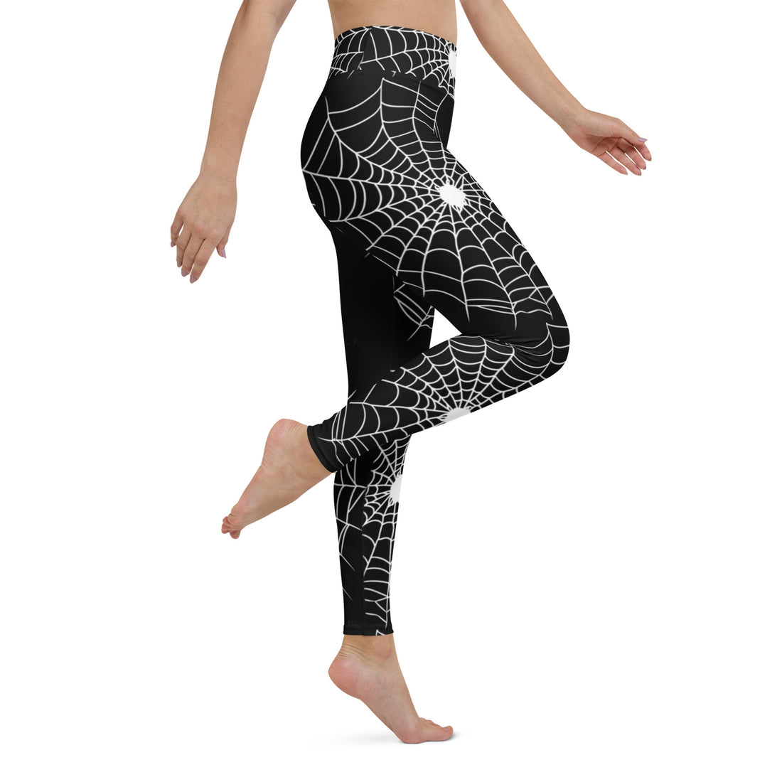 Halloween-themed yoga leggings featuring a spider web design on a black background.