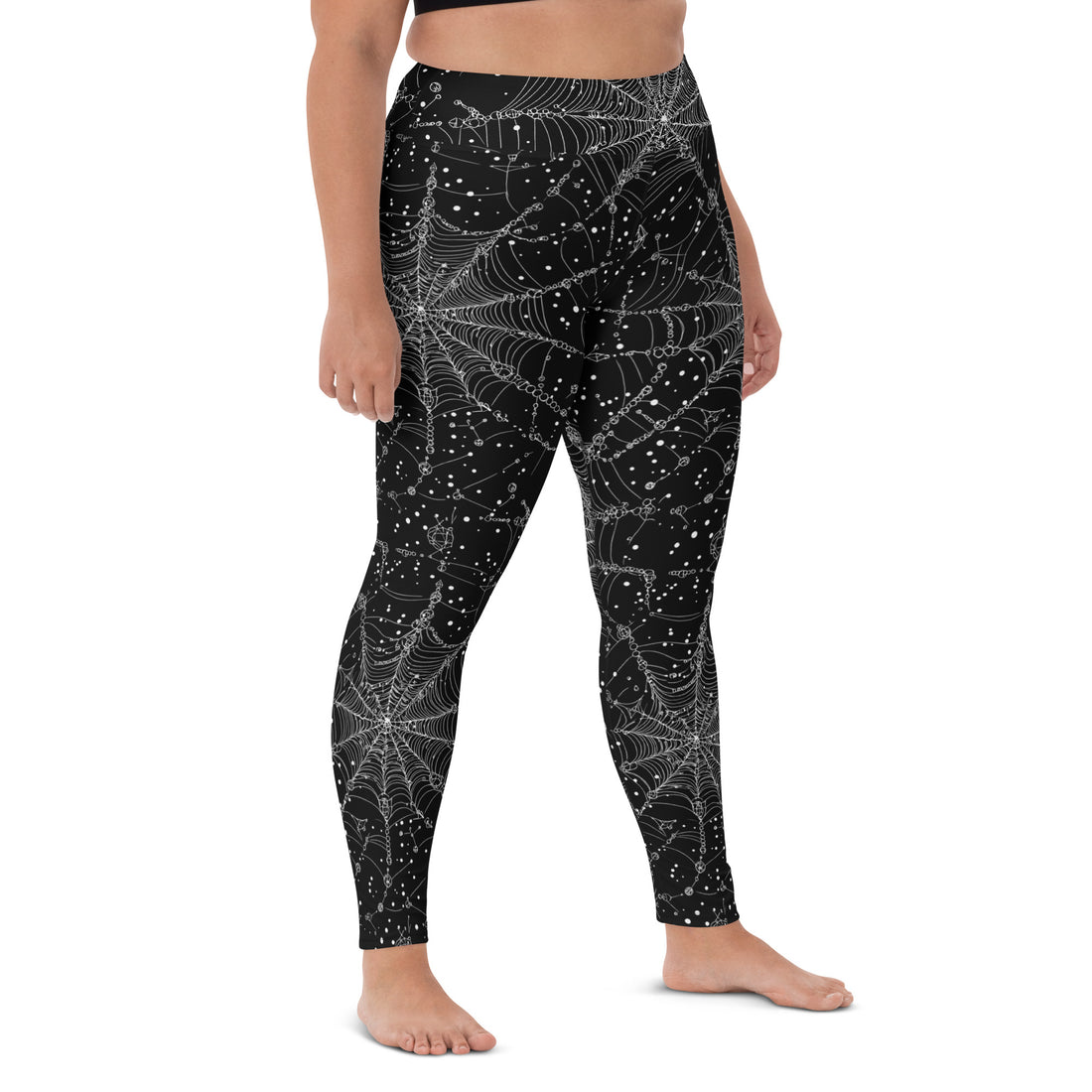 Spooky Cosmos Yoga Leggings with a spider web design on a model