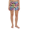 Colorful leopard print yoga shorts featuring pastel hues and a high waistband.