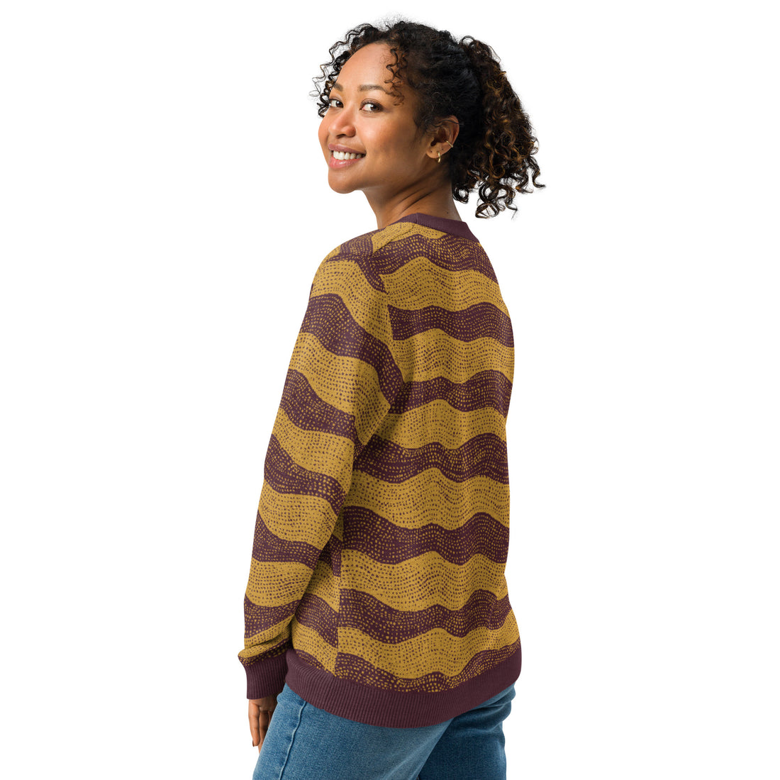 Cozy knitted crew neck sweater with unique wave design in earth tones, ideal for fall and winter fashion.