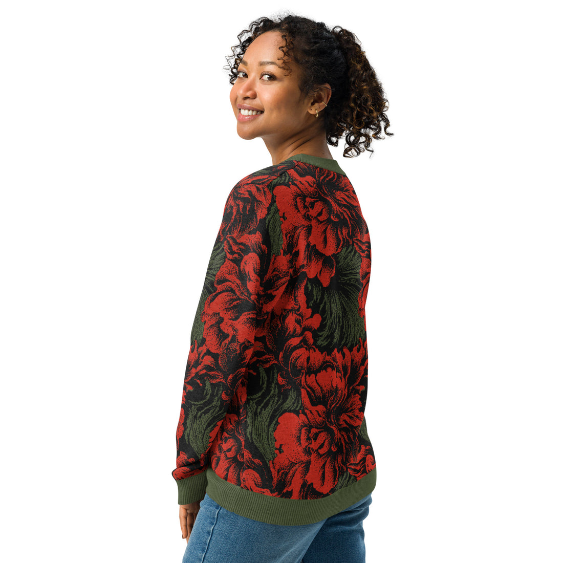 Floral red and green knitted sweater with crew neck and vibrant floral patterns.