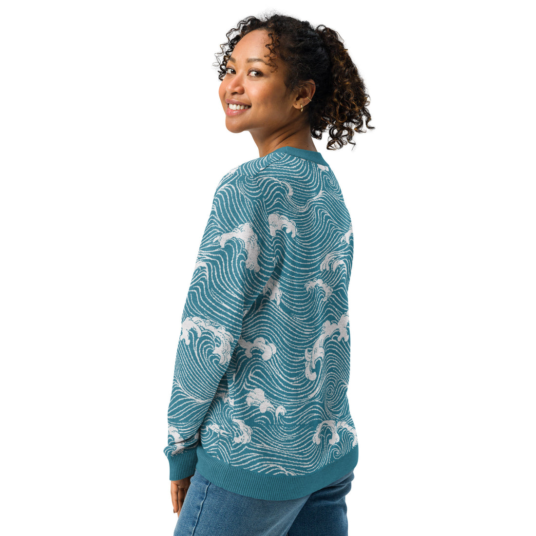 Ocean wave knitted sweater with polar bear designs in blue