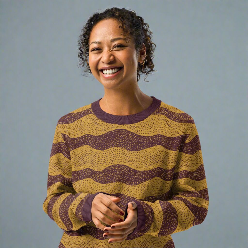 Cozy knitted crew neck sweater with unique wave design in earth tones, ideal for fall and winter fashion.