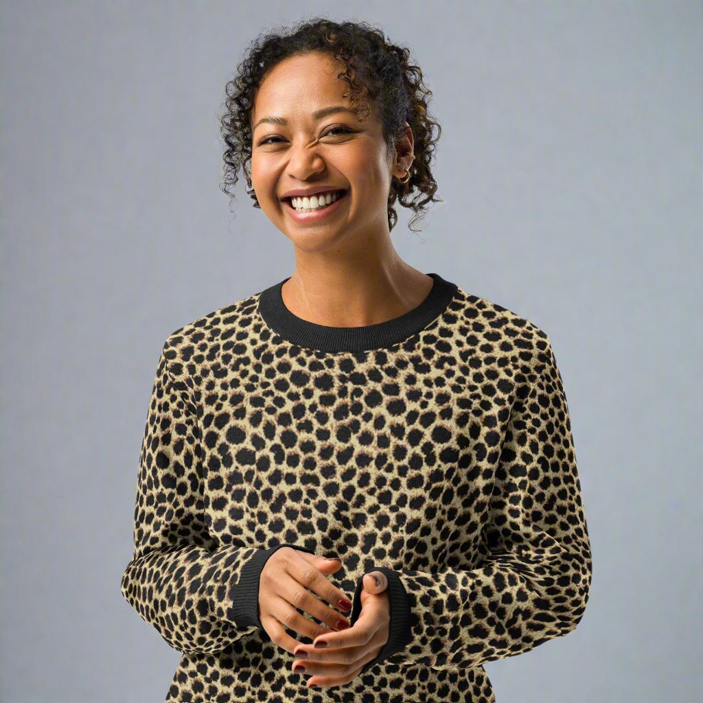 Woman wearing a cozy leopard print knit sweater with crew neck, perfect for fall and winter fashion, featuring a soft fabric.