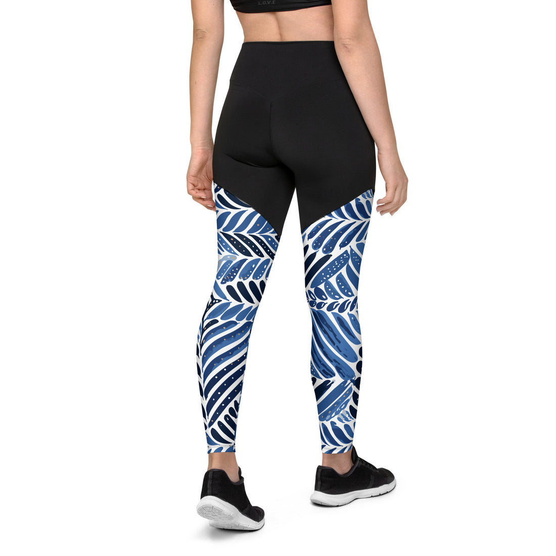 Chic compression sports leggings with leaf print design in navy and black colors