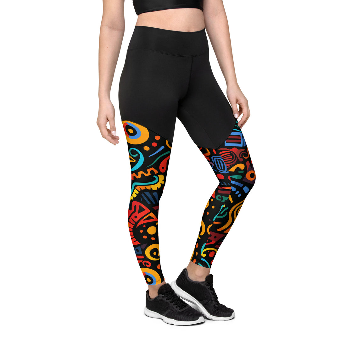 Vibrant compression sports leggings with colorful abstract patterns, high-waisted design, and black contrasting fabric.