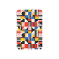 Colorful geometric sherpa blanket with vibrant patterns in red, blue, yellow, and black.