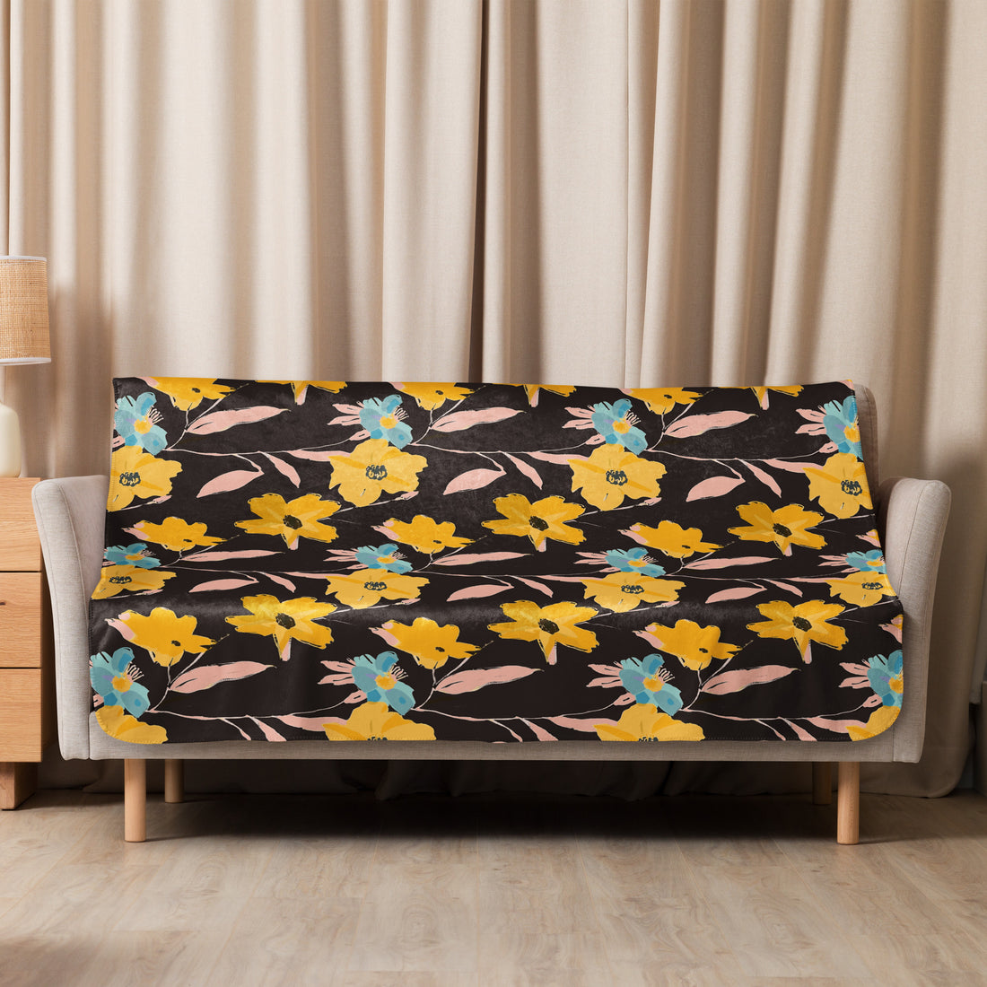 Floral Harmony Sherpa Blanket with vibrant yellow and teal blooms on a black background, perfect for winter coziness.