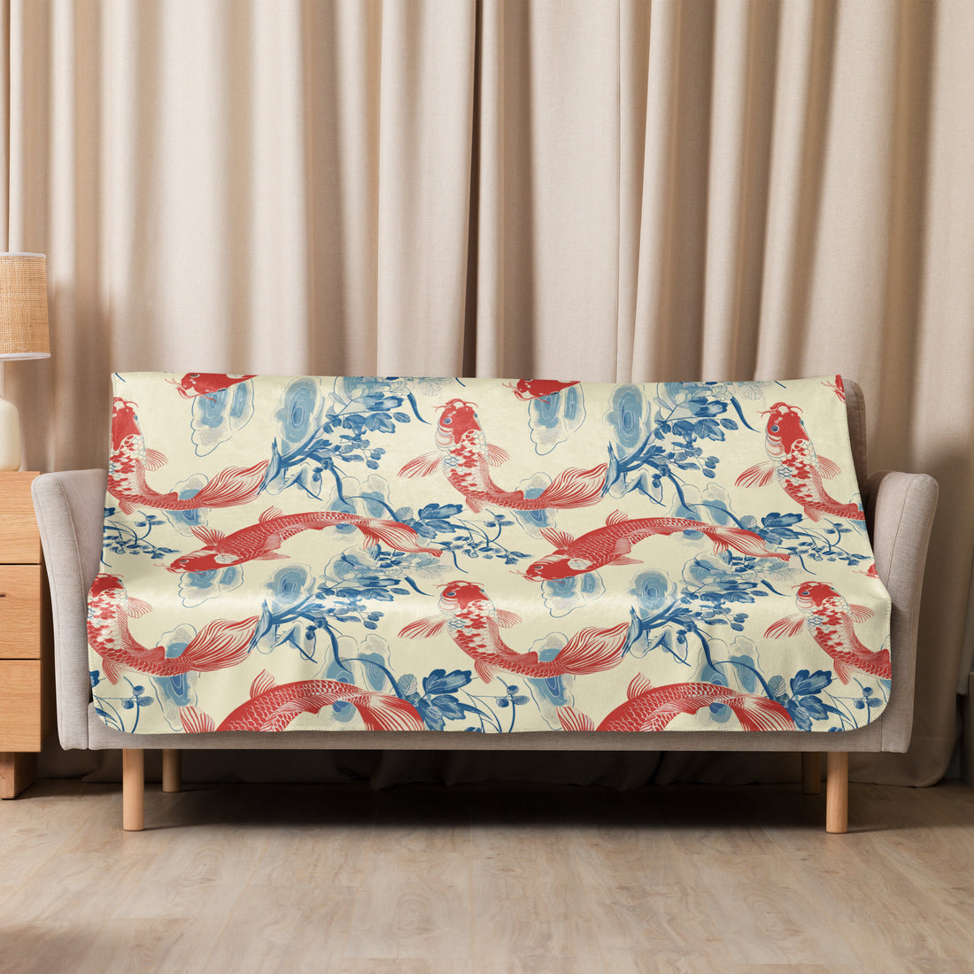 Sherpa blanket with red koi fish and blue floral design on cream background, creating a cozy and stylish aesthetic for holiday and winter use.